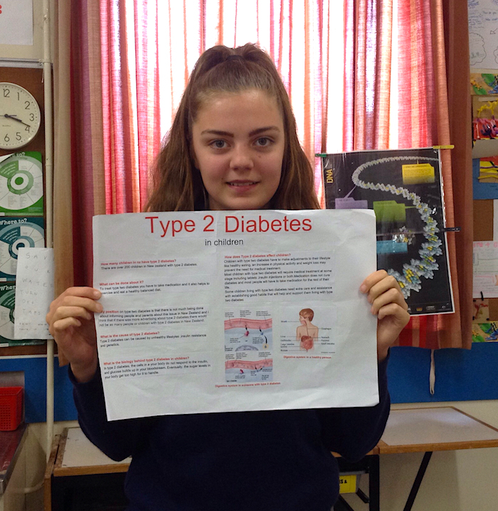 Anna Davis displays her work on Type 2 diabetes