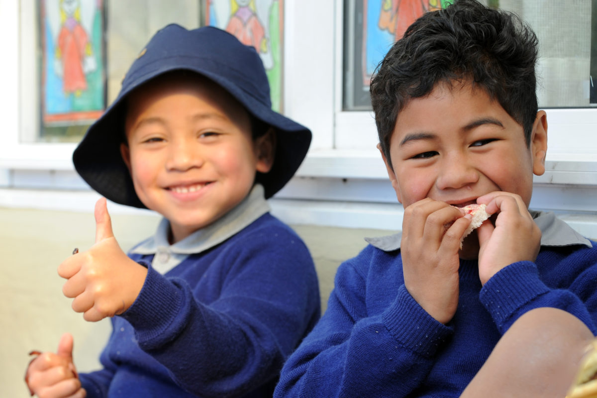 Kids enjoying lunch at school, photo by Chris Sullivan.