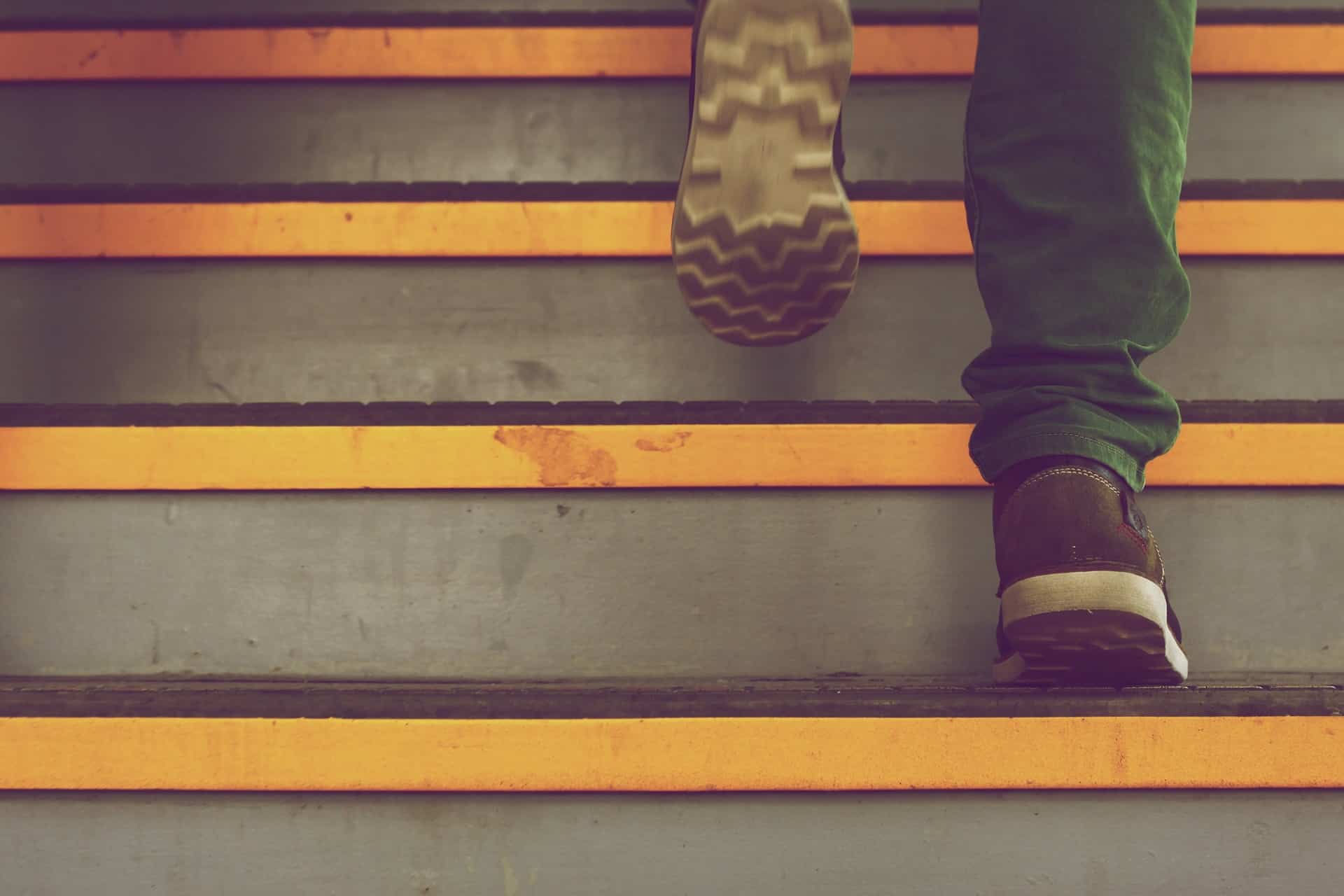 Person walking up steps